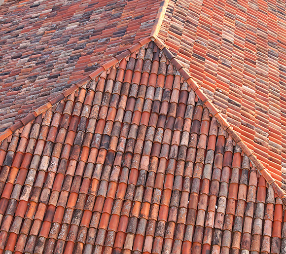 roof with terracotta tiles showing a pattern of colors and textures ideal for 4 season weather conditions