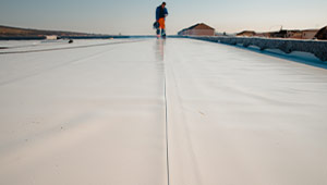 A man Flat Roofing